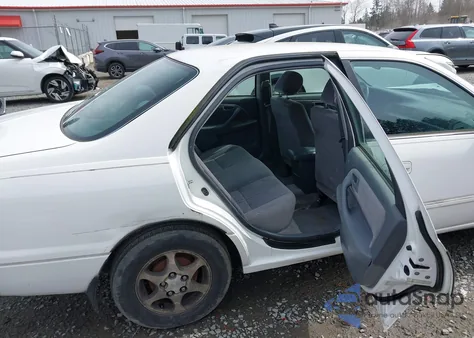 1999 Toyota Camry Le из США, поврежденный, VIN JT2BG22K9X0376990